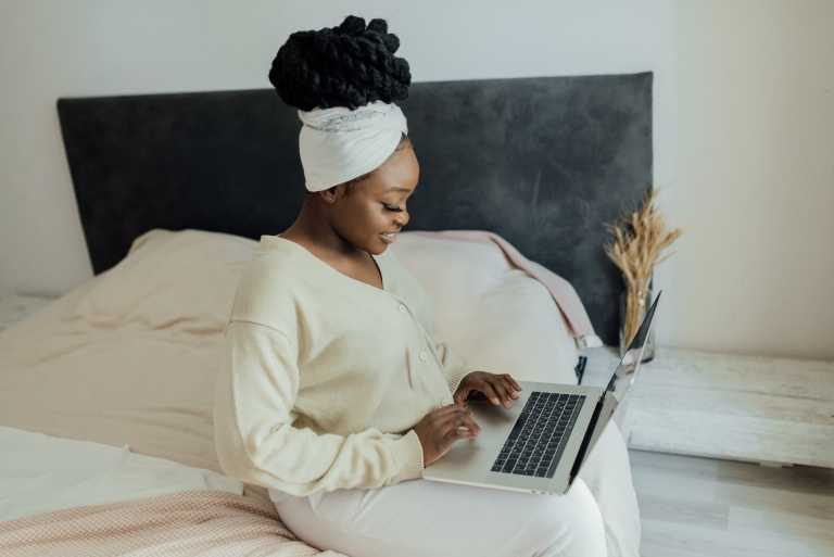 woman working on her laption
