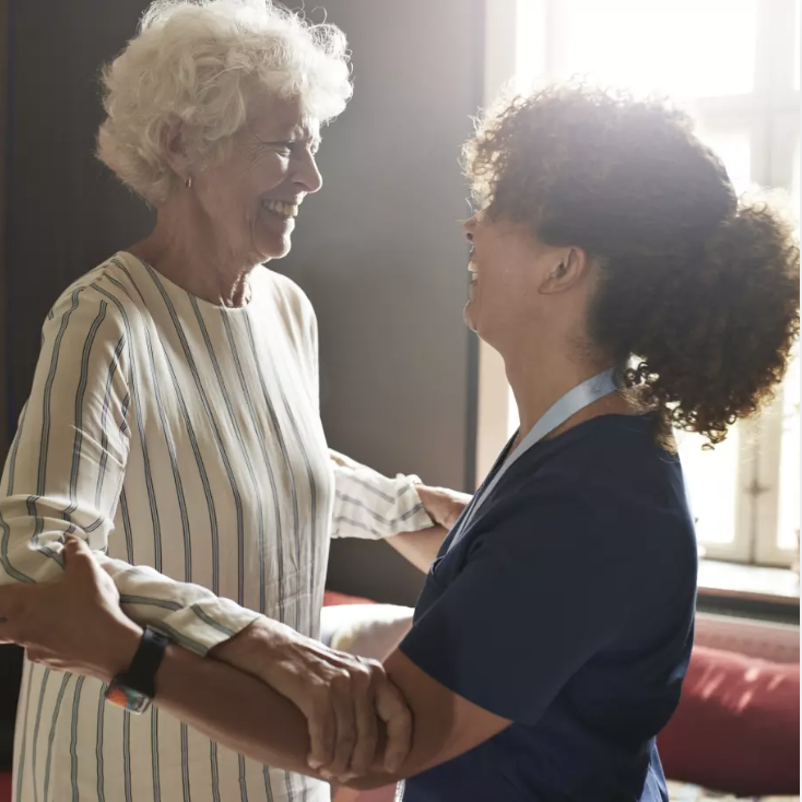 caregiver assisting a member